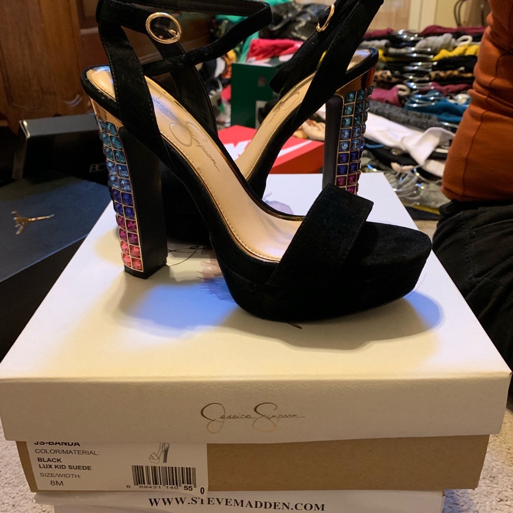 Black Jessica Simpson platform heels.
